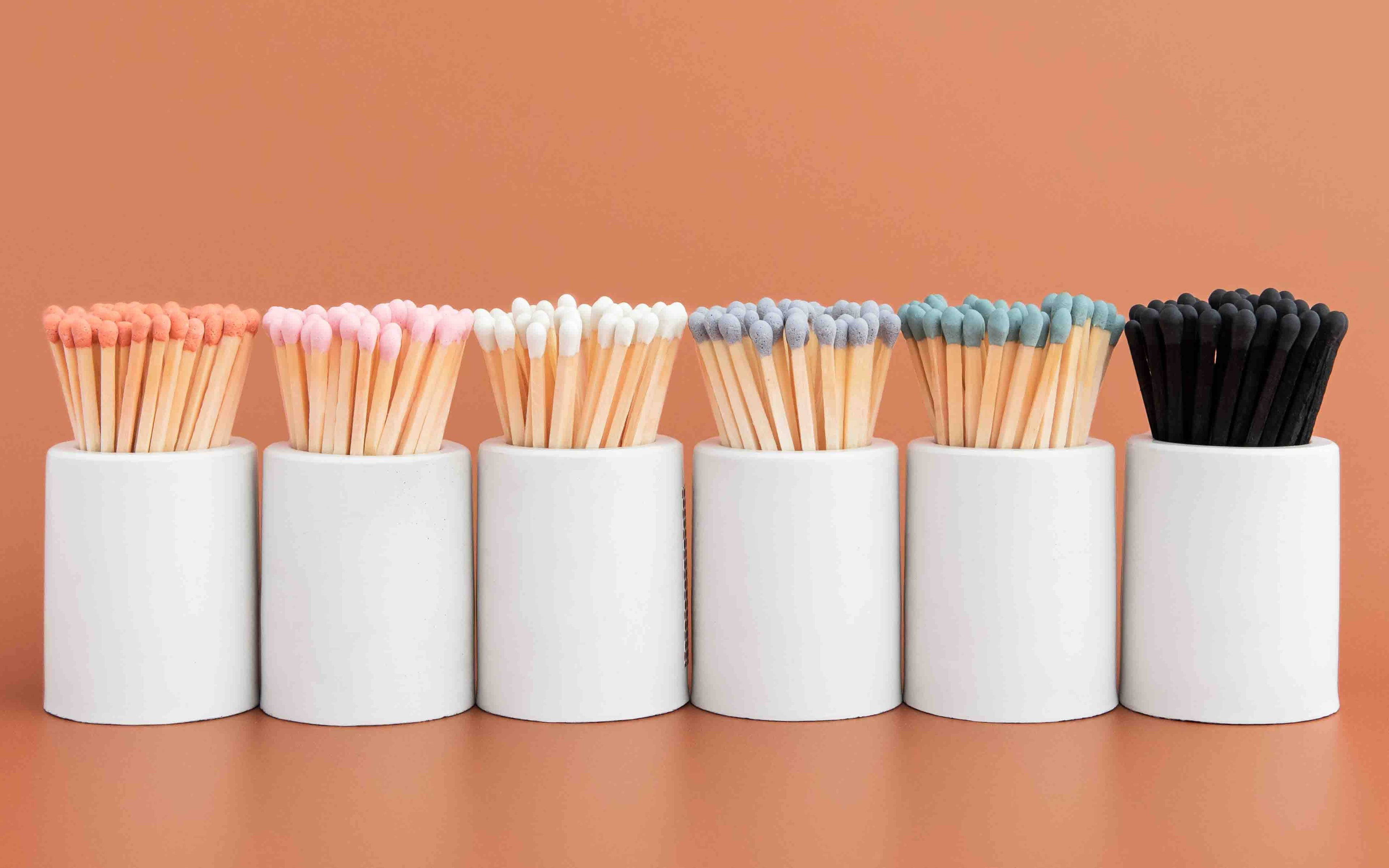 White Round Vessel with Grey Matchsticks