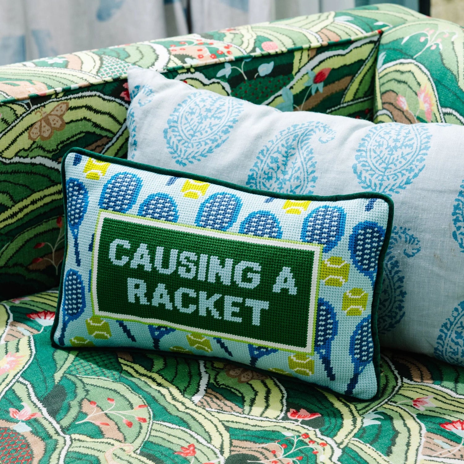 Causing A Racket Needlepoint Pillow