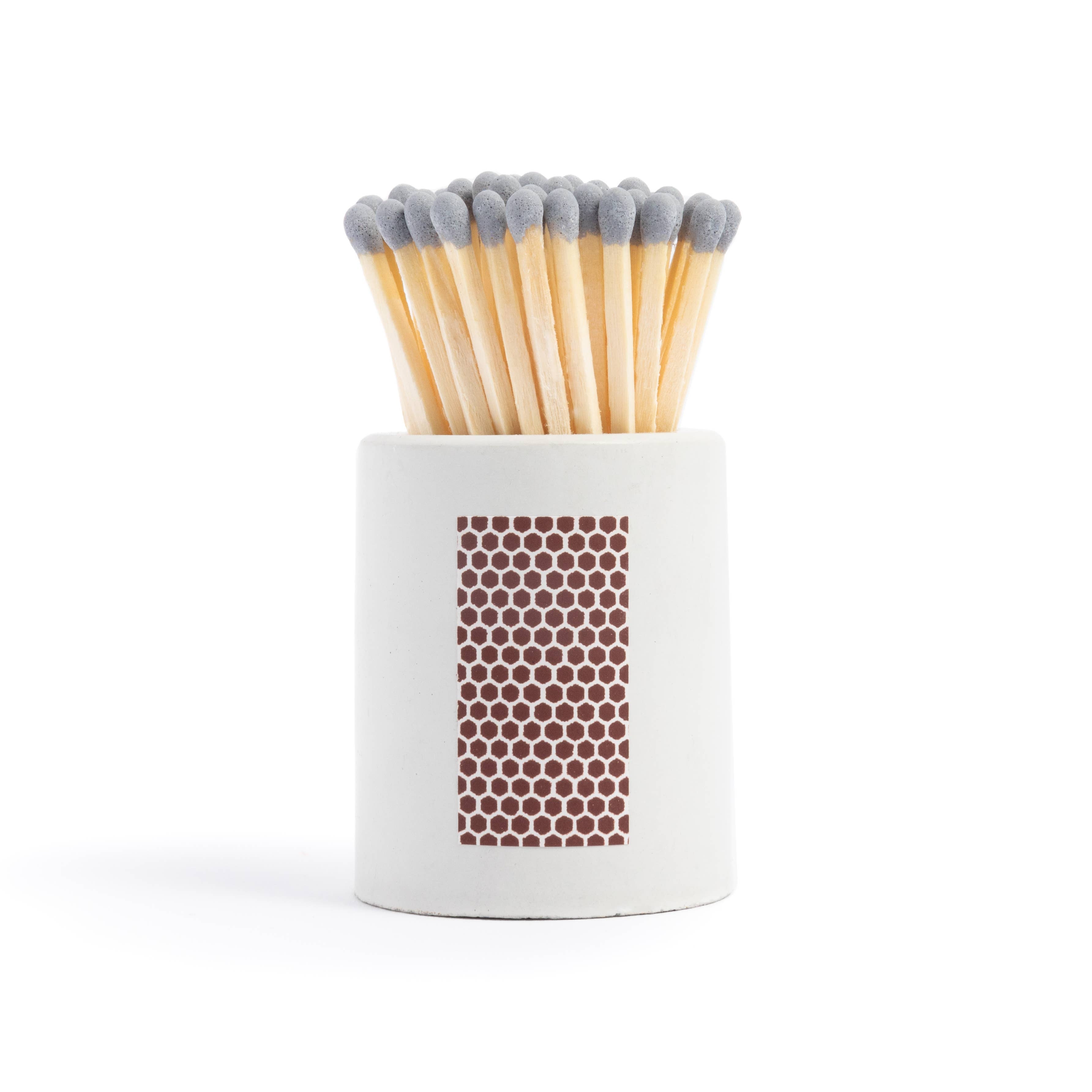 White Round Vessel with Grey Matchsticks